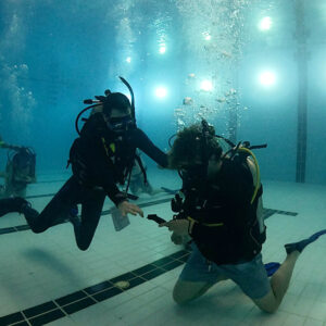Vancouver Divemaster course, instructor helps divemaster candidate